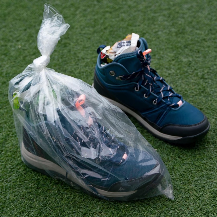 Cover shoes with plastic bags or plastic wrap