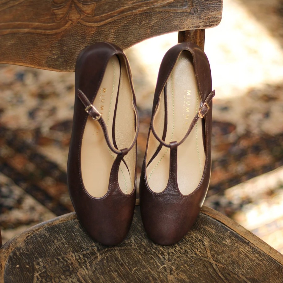 Leather skirt with flat shoes