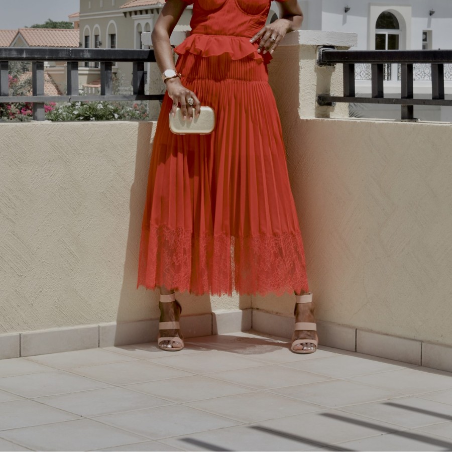 Red dress with nude shoes