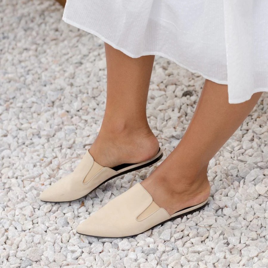Pair pinafore dress with mule shoes