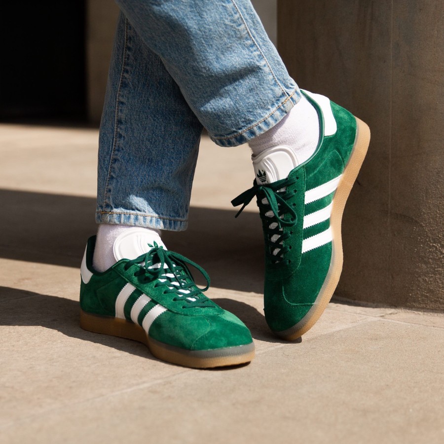 Green shoes with neutral jeans