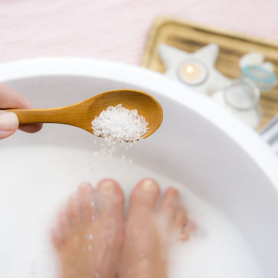 Soak feet in salt water