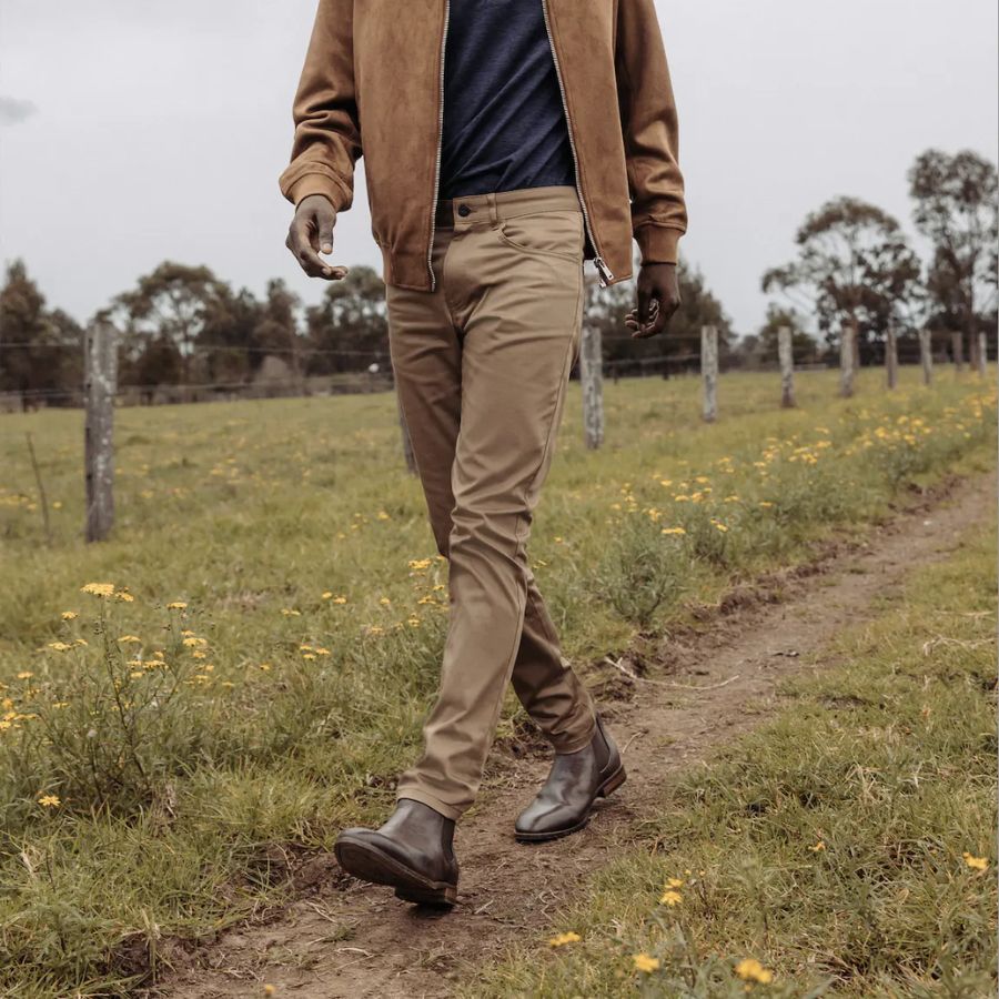 Matching men's boots with khaki pants