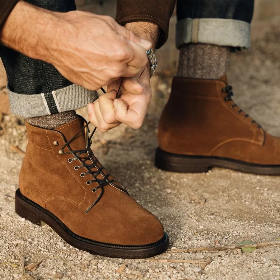 Check the shoe material before using the spray.